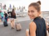 A women standing in line to get on a plane