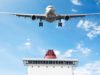 Plane flying over a cruise ship