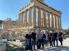 Fam Trip Greece group photo in front of Acropolis
