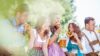 Five Friends Having Fun On Bavarian River With Beer Glasses